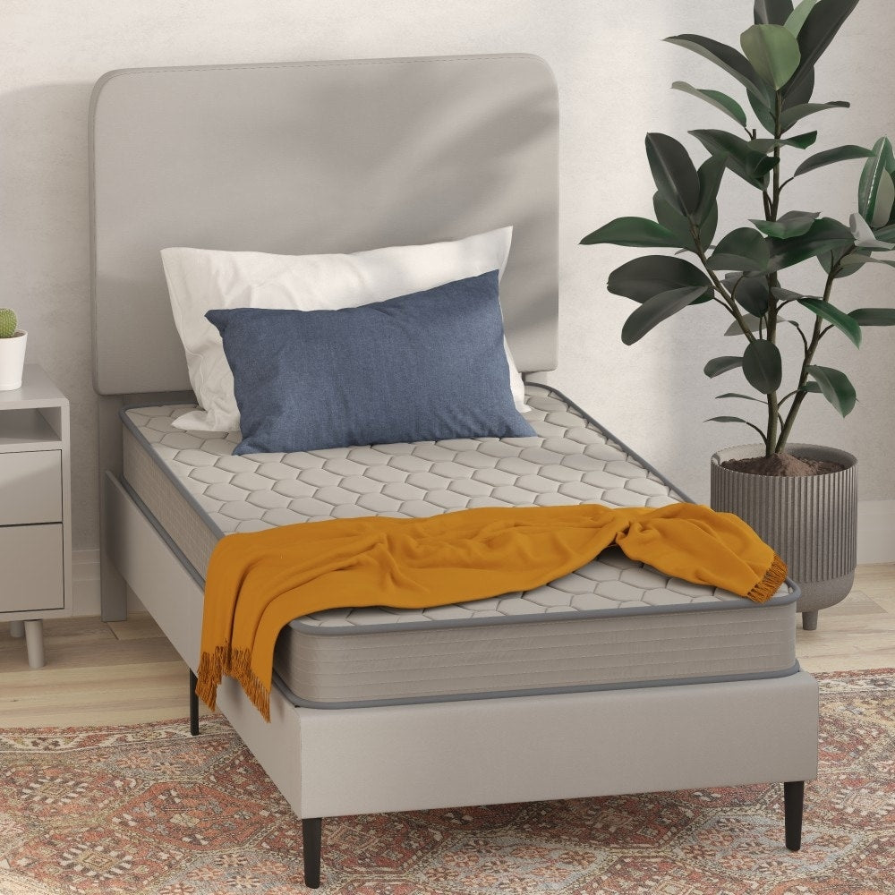 Matelas hybride à ressorts à revêtement semi-rigide de densité moyenne
