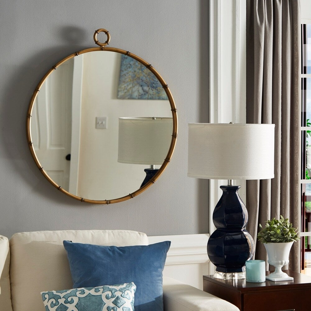 Marza Miroir mural rond avec finition laiton antique de iNSPIRE Q Modern