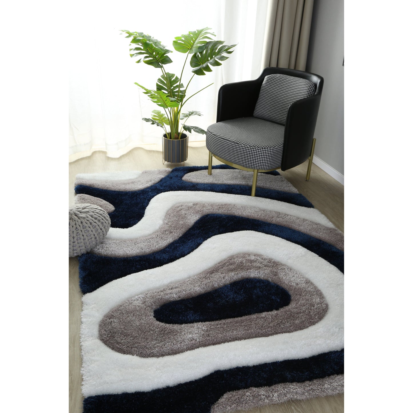 Tapis de sol Mateos Shag à motif abstrait