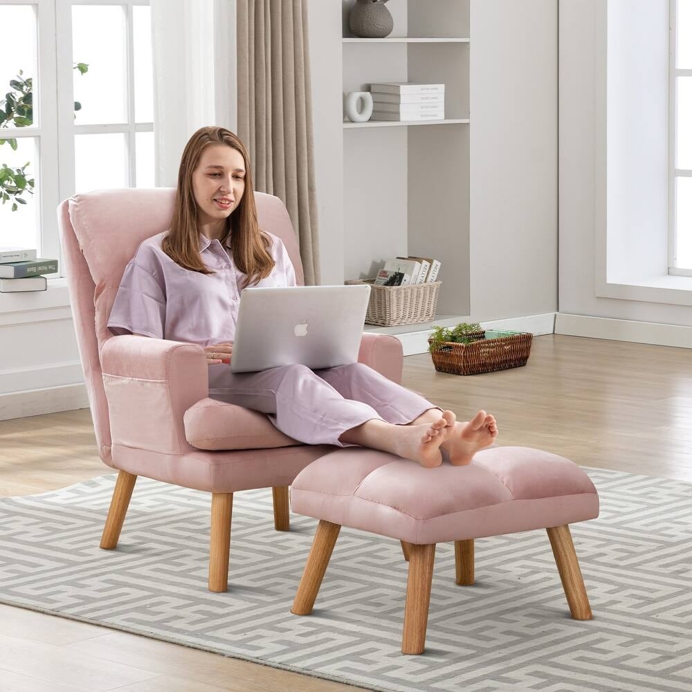 Fauteuil de salon confortable en tissu avec dossier et repose-pieds réglables.