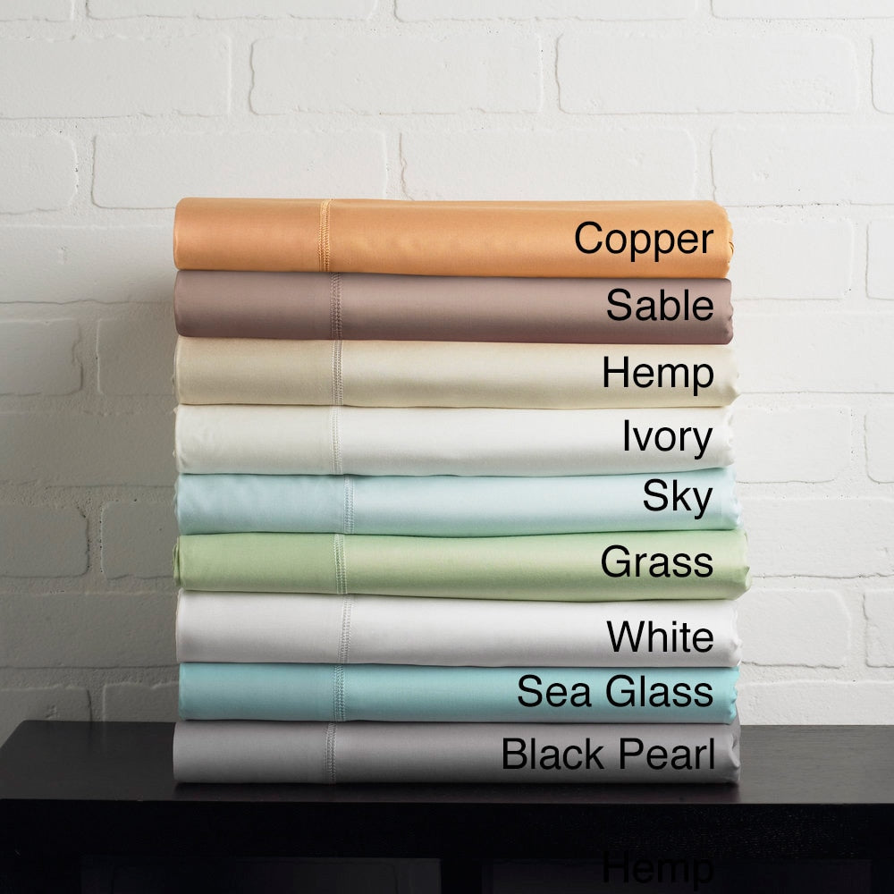 Jeu de draps en rayonne de bambou respirante, couleur unie, avec poches profondes.
