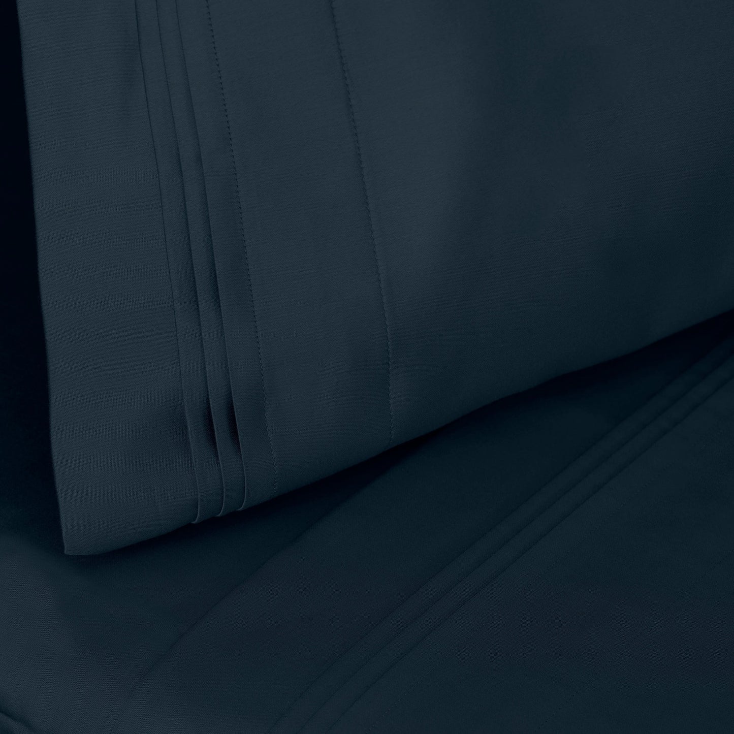 Jeu de draps uni en coton égyptien supérieur, 1000 fils, avec poche profonde.