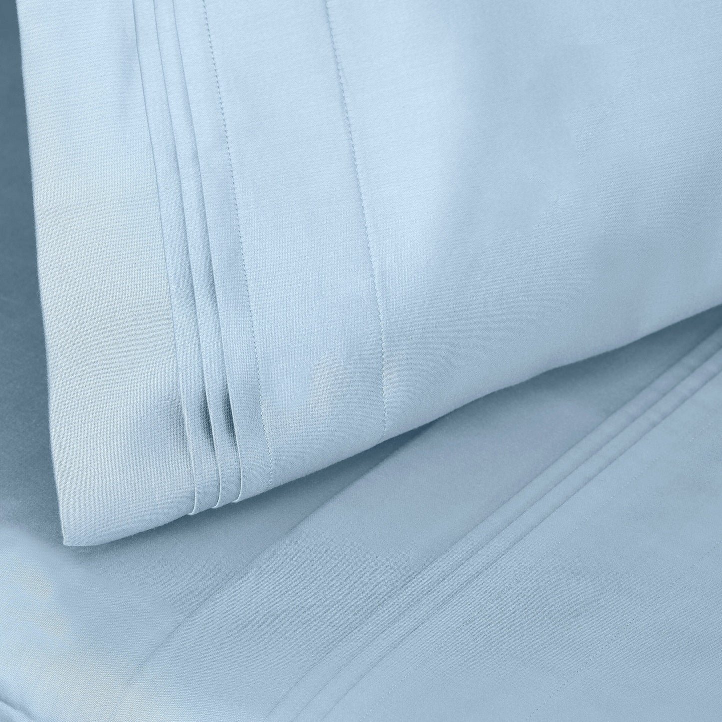 Jeu de draps uni en coton égyptien supérieur, 1000 fils, avec poche profonde.