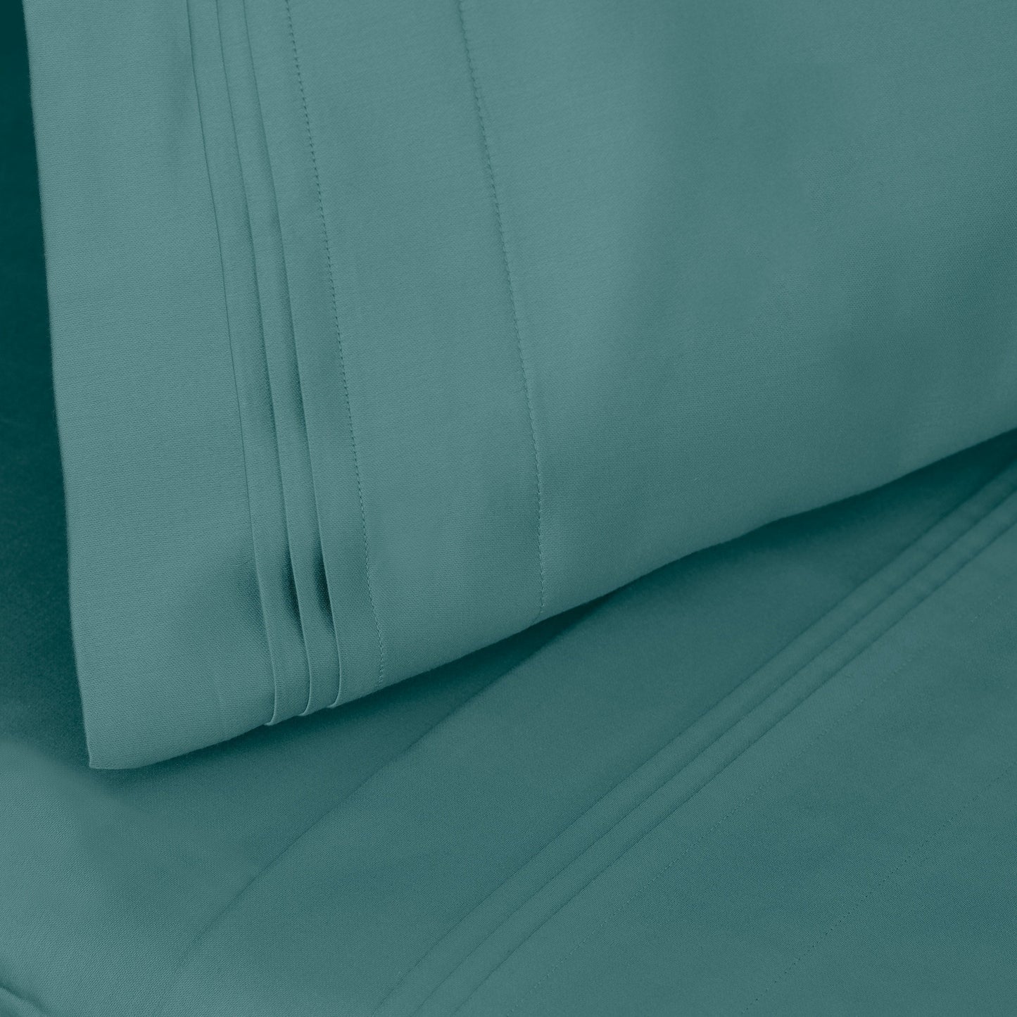 Jeu de draps uni en coton égyptien supérieur, 1000 fils, avec poche profonde.