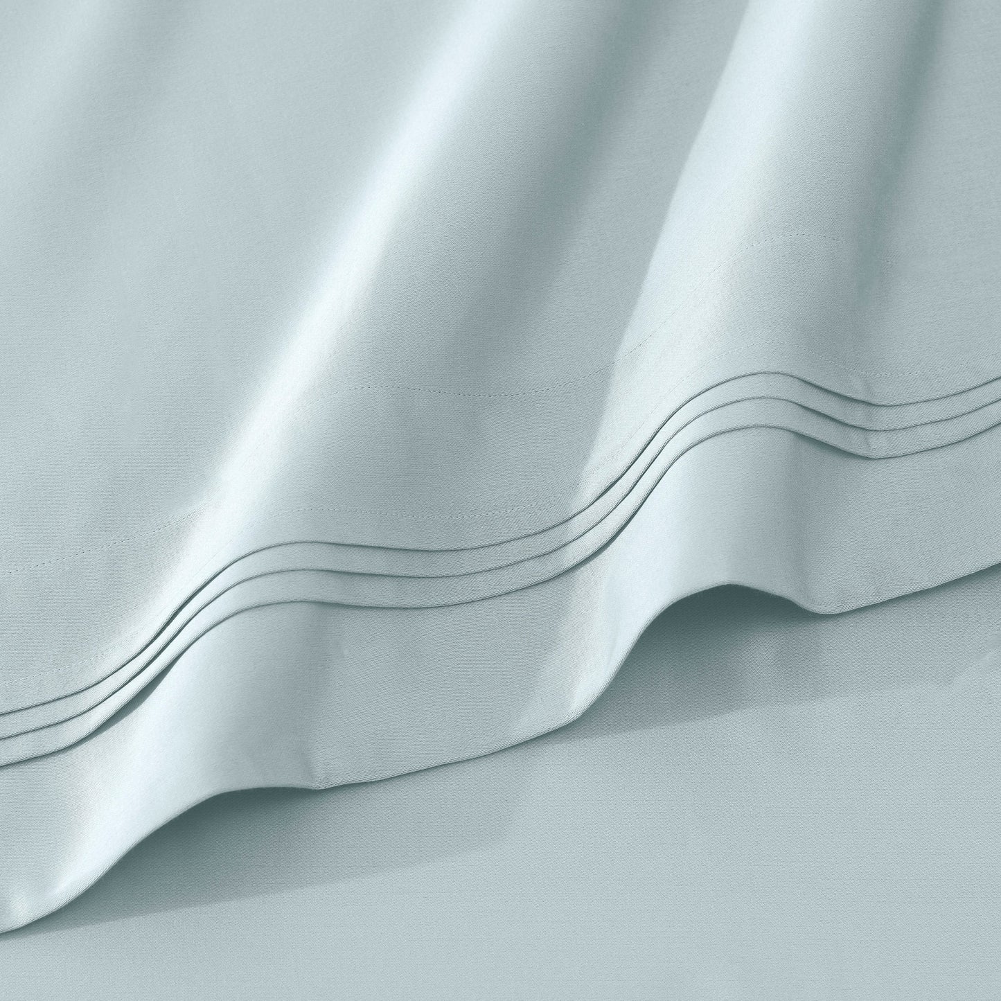 Jeu de draps uni en coton égyptien supérieur, 1000 fils, avec poche profonde.
