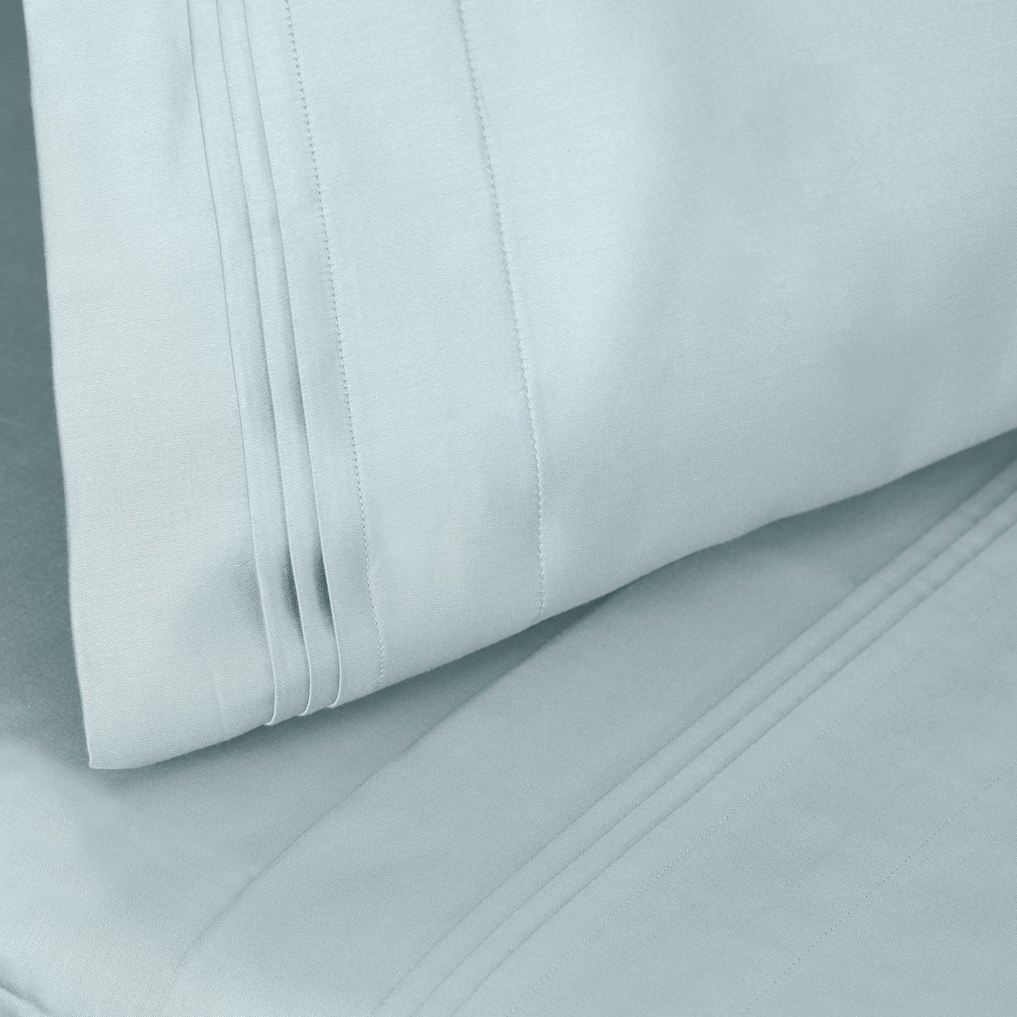 Jeu de draps uni en coton égyptien supérieur, 1000 fils, avec poche profonde.