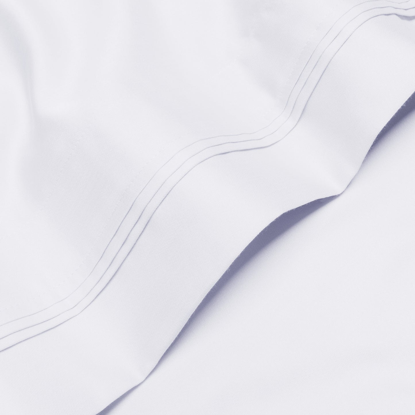 Jeu de draps uni en coton égyptien supérieur, 1000 fils, avec poche profonde.