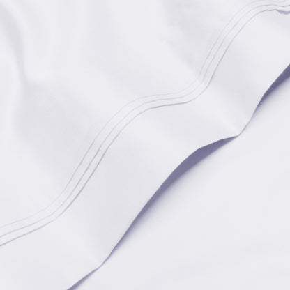 Jeu de draps uni en coton égyptien supérieur, 1000 fils, avec poche profonde.