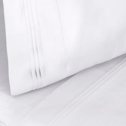 Jeu de draps uni en coton égyptien supérieur, 1000 fils, avec poche profonde.