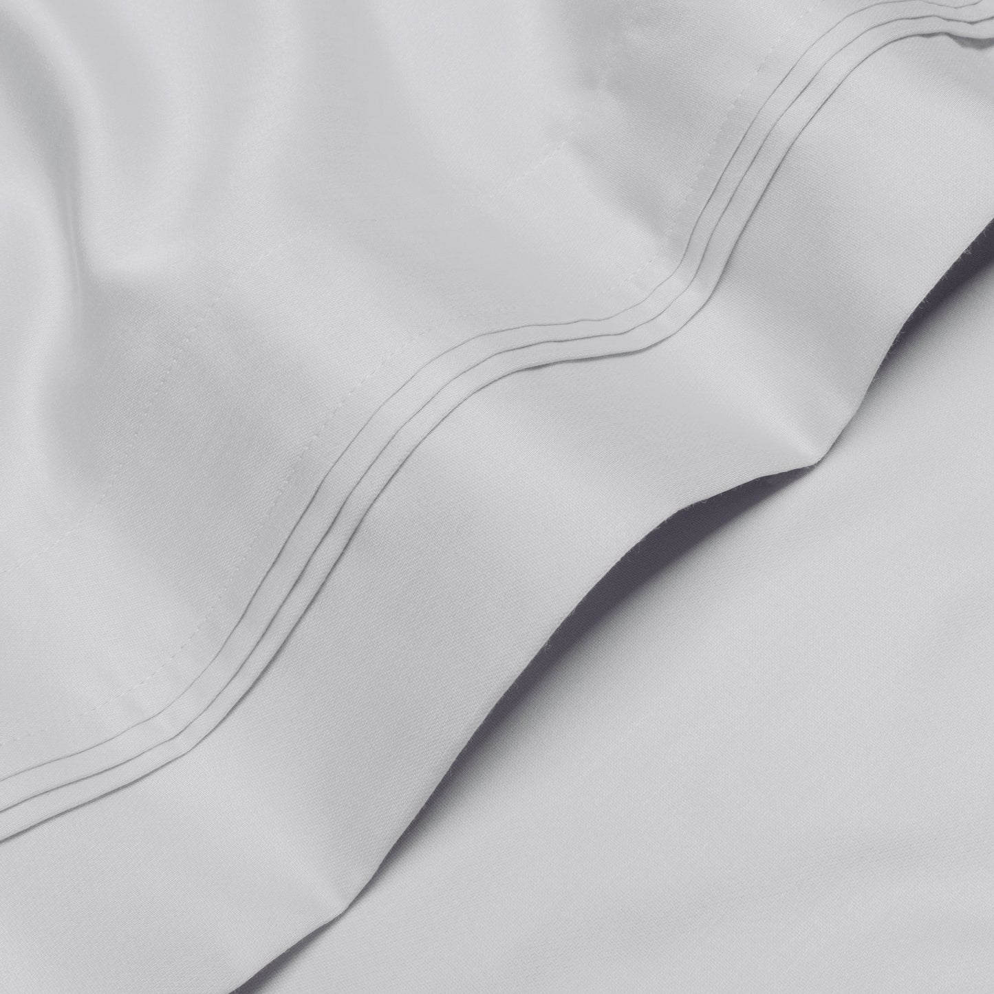 Jeu de draps uni en coton égyptien supérieur, 1000 fils, avec poche profonde.