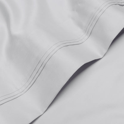 Jeu de draps uni en coton égyptien supérieur, 1000 fils, avec poche profonde.