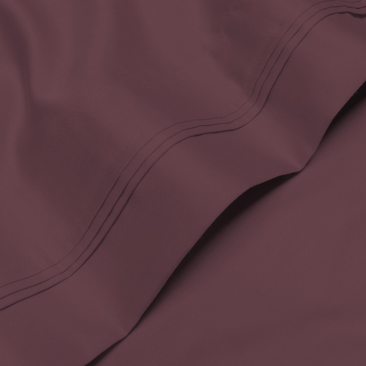 Jeu de draps uni en coton égyptien supérieur, 1000 fils, avec poche profonde.