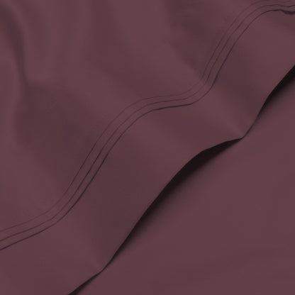 Jeu de draps uni en coton égyptien supérieur, 1000 fils, avec poche profonde.