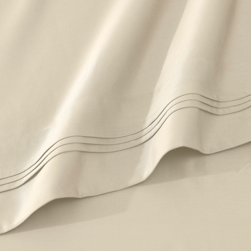 Jeu de draps uni en coton égyptien supérieur, 1000 fils, avec poche profonde.