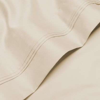 Jeu de draps uni en coton égyptien supérieur, 1000 fils, avec poche profonde.