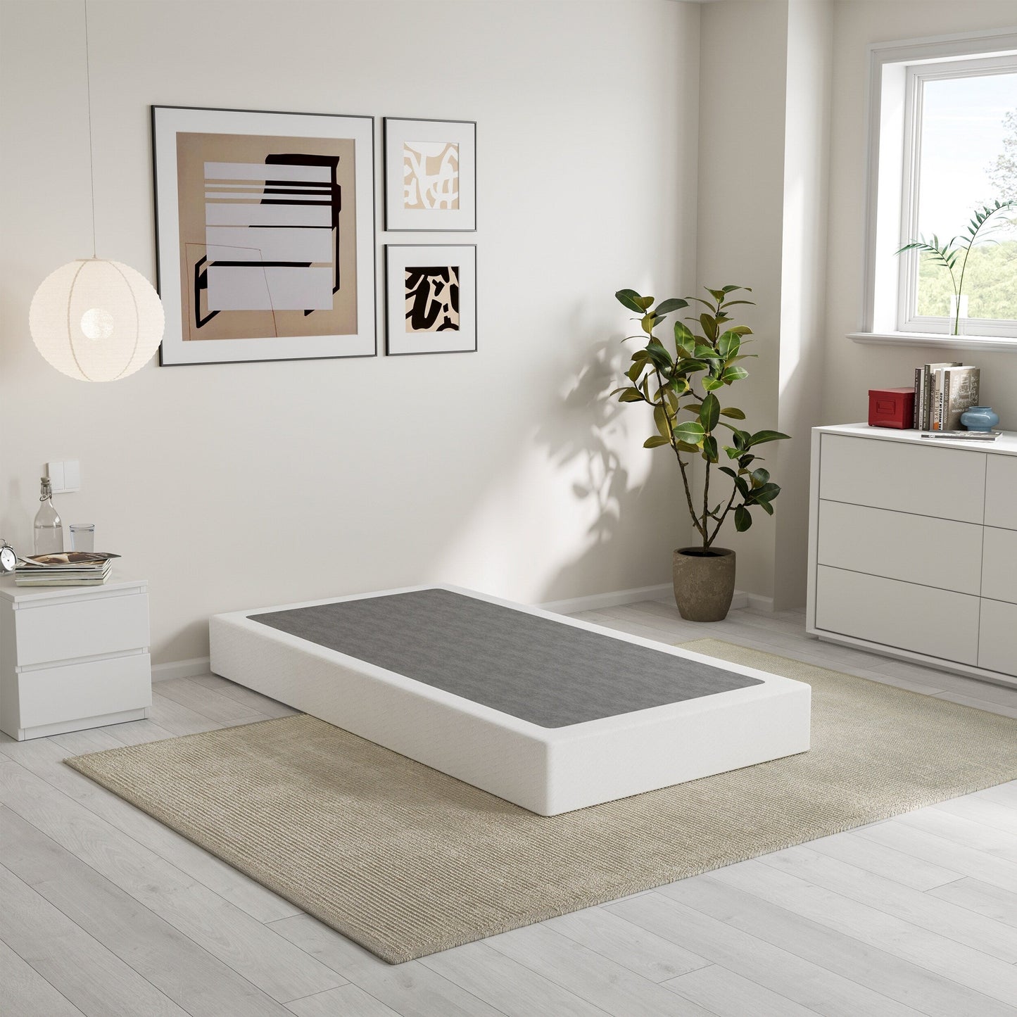 Ressort métallique à faible encombrement de 5 pouces, structure robuste avec revêtement gris.