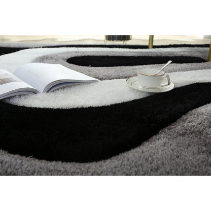 Tapis de sol Mateos Shag à motif abstrait