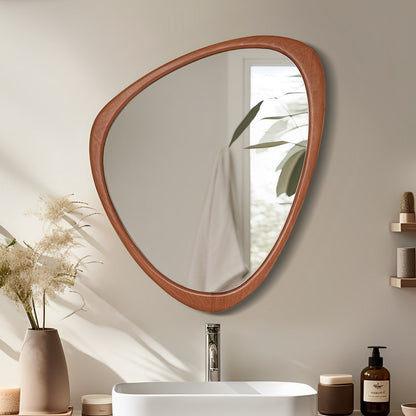 Miroir mural asymétrique en forme de galet avec cadre en pin.
