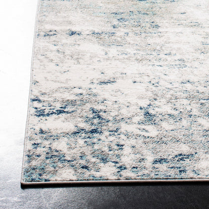 Tapis abstrait moderne SAFAVIEH Jasper Shreya - Gris/Bleu - 2,44 m x 3,05 m