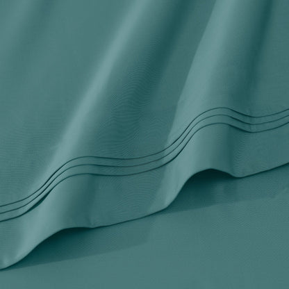 Jeu de draps uni en coton égyptien supérieur, 1000 fils, avec poche profonde.