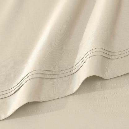 Jeu de draps uni en coton égyptien supérieur, 1000 fils, avec poche profonde.
