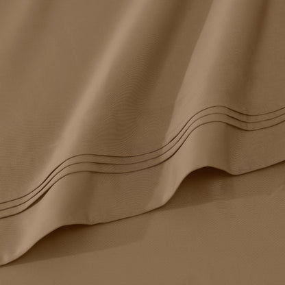Jeu de draps uni en coton égyptien supérieur, 1000 fils, avec poche profonde.