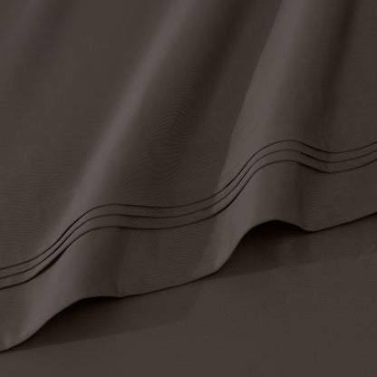 Jeu de draps uni en coton égyptien supérieur, 1000 fils, avec poche profonde.