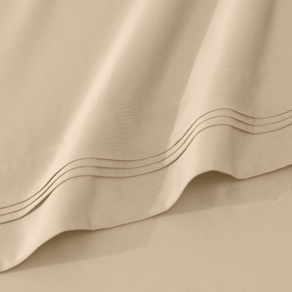 Jeu de draps uni en coton égyptien supérieur, 1000 fils, avec poche profonde.