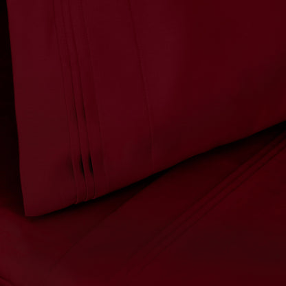 Jeu de draps uni en coton égyptien supérieur, 1000 fils, avec poche profonde.