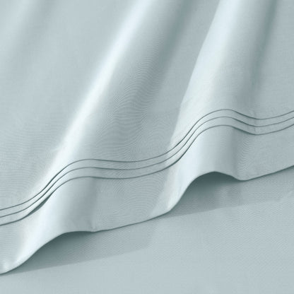 Jeu de draps uni en coton égyptien supérieur, 1000 fils, avec poche profonde.