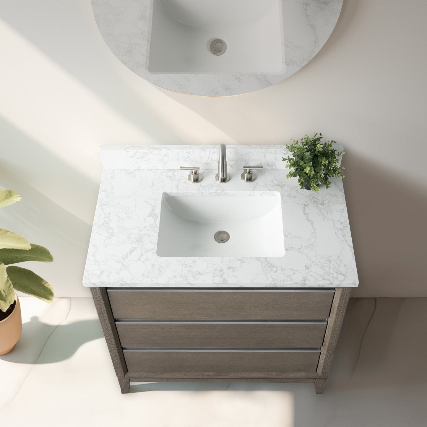 Meuble-lavabo Art pour salle de bain avec lavabo en céramique et plan de travail en marbre composite.
